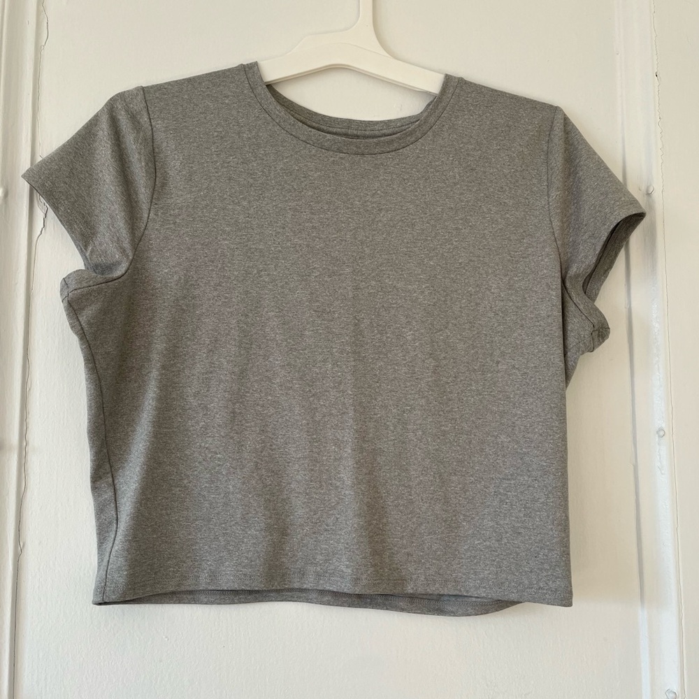 SOFT STRETCH SEAMLESS FABRIC LONGLINE BABY TEE